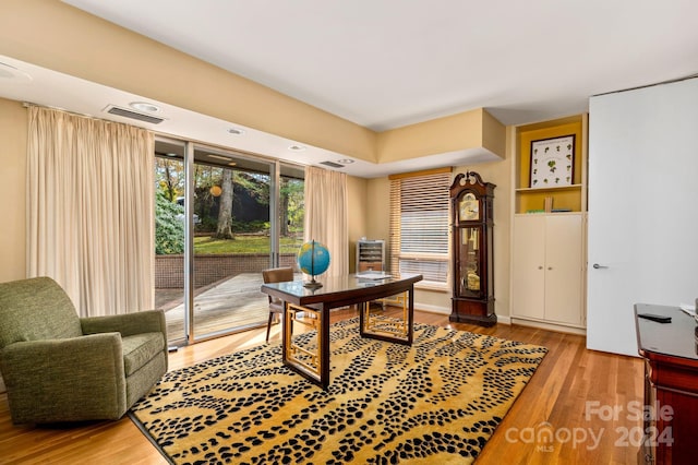 office featuring hardwood / wood-style flooring