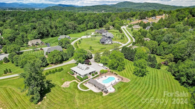 drone / aerial view featuring a mountain view