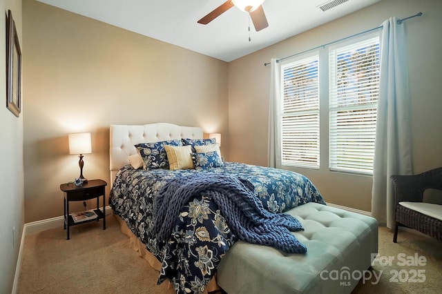 carpeted bedroom with ceiling fan