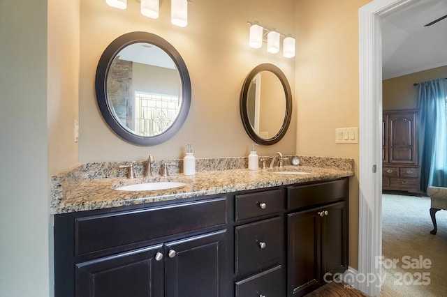 bathroom with vanity and ceiling fan