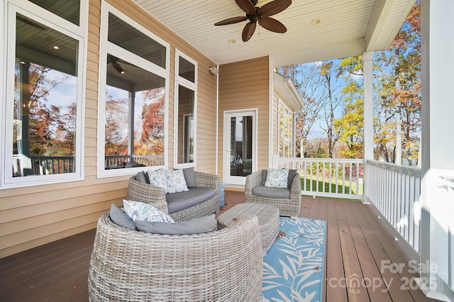 wooden deck with ceiling fan