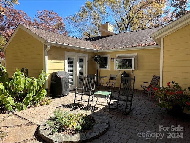 back of house featuring a patio area