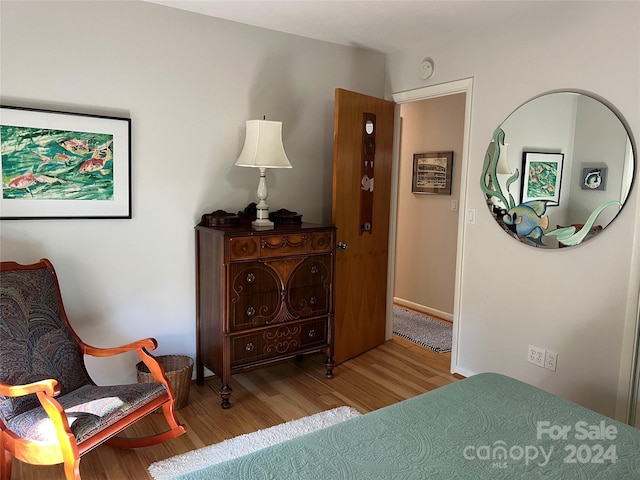 bedroom with wood-type flooring