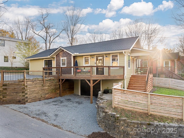 view of front of house featuring a wooden deck