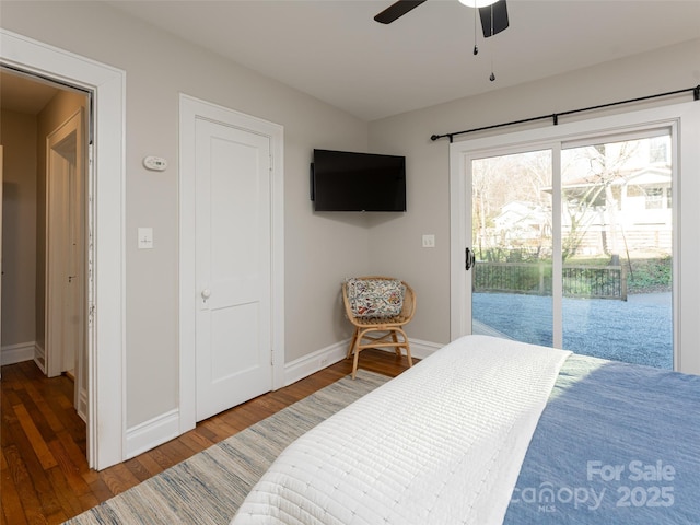 bedroom with access to outside, dark hardwood / wood-style floors, and ceiling fan