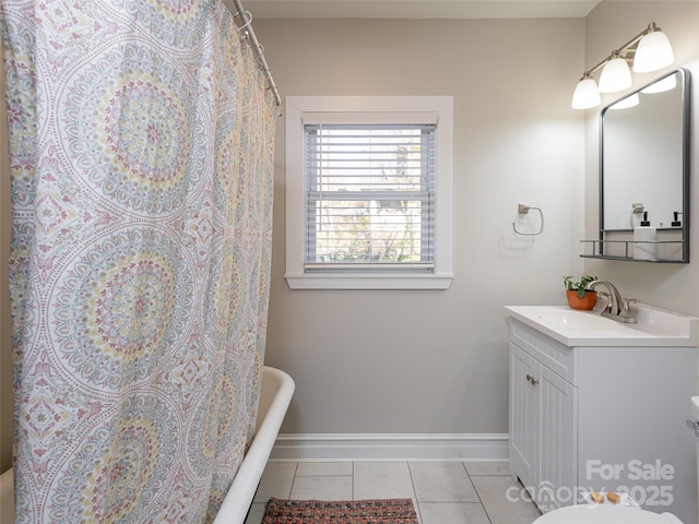 bathroom featuring vanity and tile patterned flooring