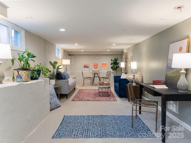 living room featuring concrete floors