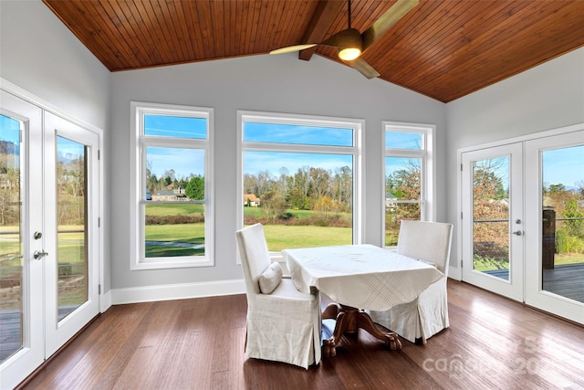 sunroom / solarium with a wealth of natural light, french doors, wooden ceiling, and lofted ceiling with beams