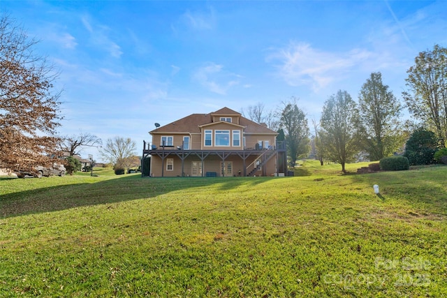 back of property featuring stairs, a deck, and a lawn