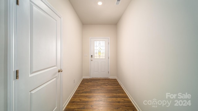 doorway featuring dark hardwood / wood-style flooring