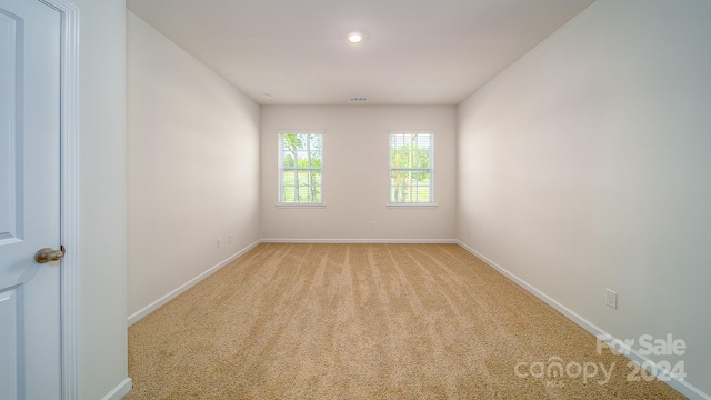 empty room with light carpet