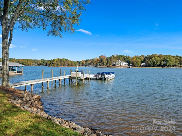 view of dock with a water view