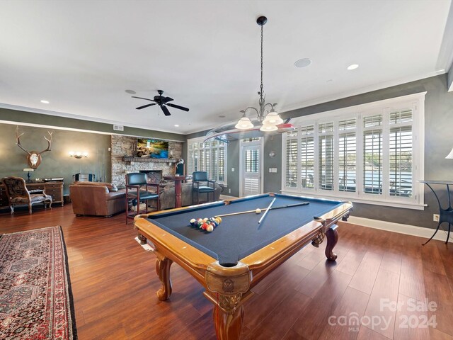 game room with billiards, ceiling fan, ornamental molding, a fireplace, and wood-type flooring