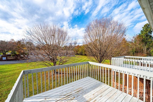 deck featuring a lawn