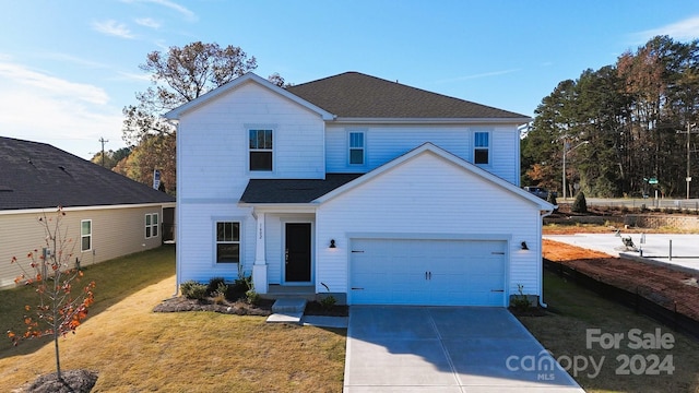 view of property featuring a front yard