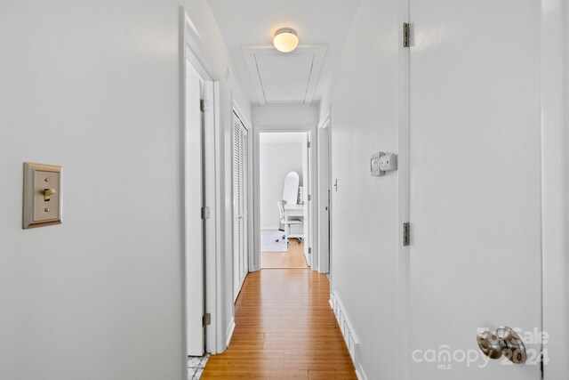 hall with light wood-type flooring