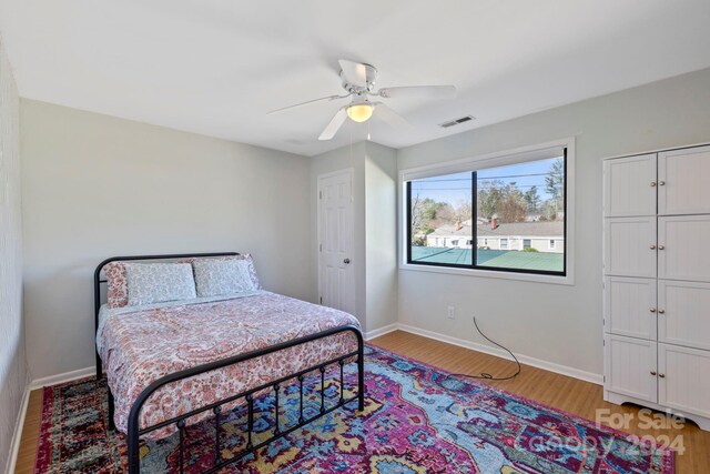 bedroom featuring ceiling fan and light wood-type flooring