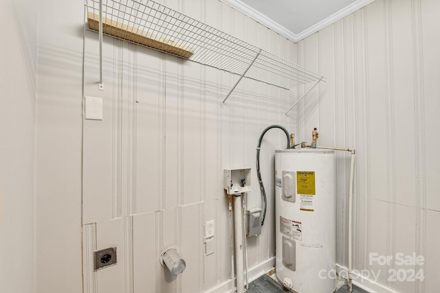 utility room featuring water heater