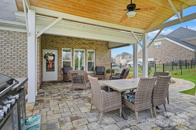 view of patio / terrace featuring ceiling fan