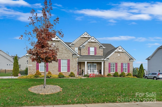 view of front of home with a front lawn