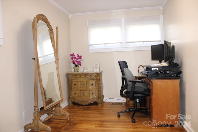 office space featuring crown molding and hardwood / wood-style flooring