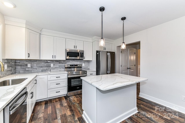 kitchen featuring white cabinets, stainless steel appliances, dark hardwood / wood-style floors, and sink