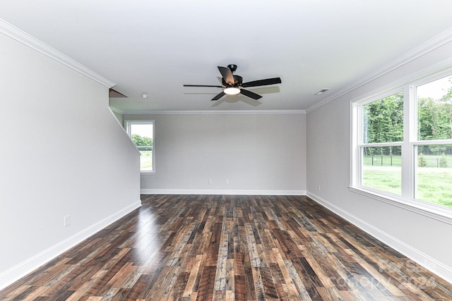 spare room with dark hardwood / wood-style floors, ceiling fan, and ornamental molding