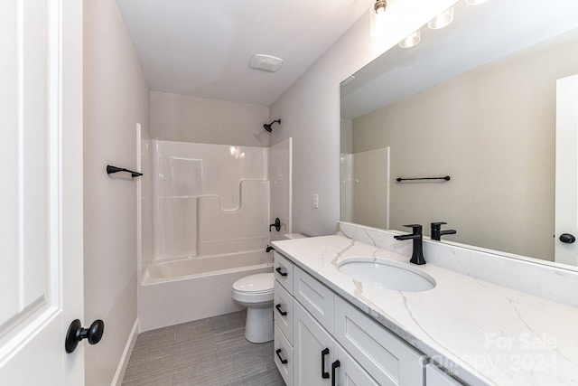 full bathroom with vanity, shower / bath combination, and toilet