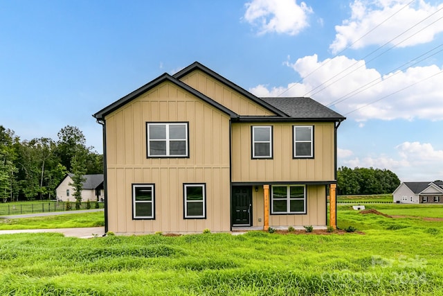 view of front of home with a front yard