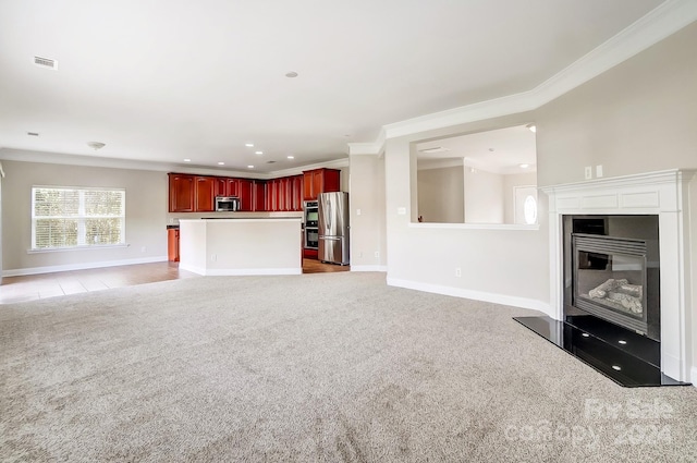 unfurnished living room featuring light carpet and crown molding