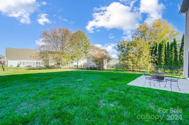 view of yard with a patio area