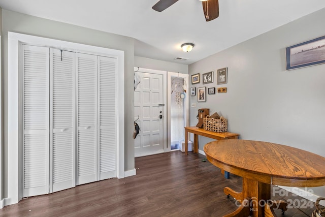 foyer featuring dark hardwood / wood-style floors and ceiling fan