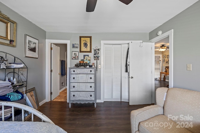 bedroom with ceiling fan, a closet, and dark hardwood / wood-style floors