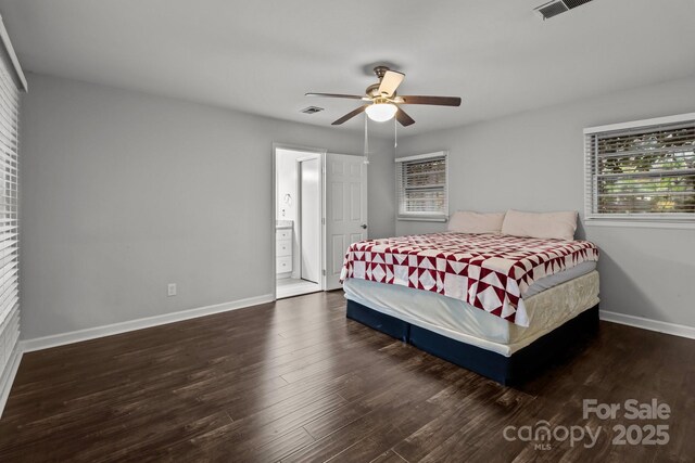 bedroom featuring ceiling fan and dark hardwood / wood-style flooring