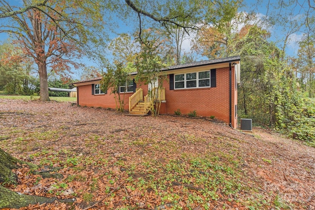 single story home with cooling unit