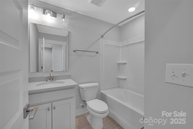 full bath featuring  shower combination, vanity, visible vents, and toilet
