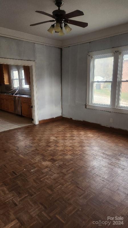 spare room featuring ceiling fan