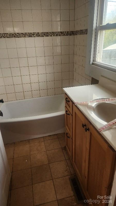 bathroom with vanity and tile patterned floors