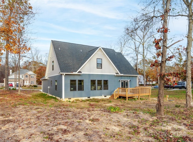 rear view of house with a deck