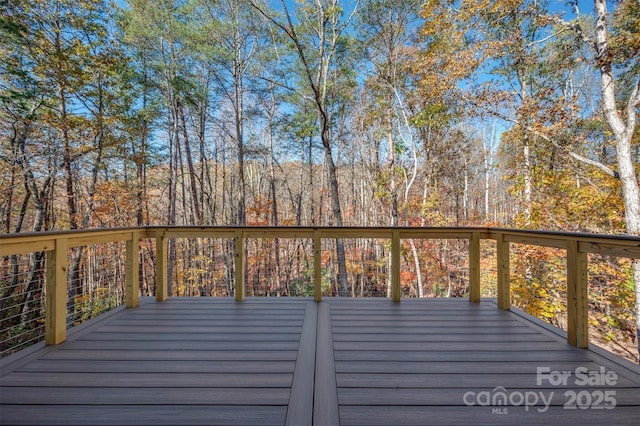 deck with a view of trees