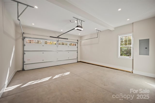 garage featuring electric panel, a garage door opener, and baseboards