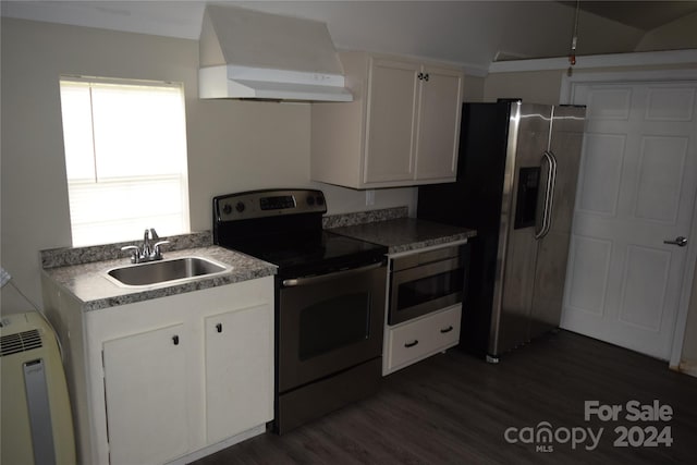 kitchen with stainless steel appliances, sink, exhaust hood, white cabinets, and dark hardwood / wood-style floors