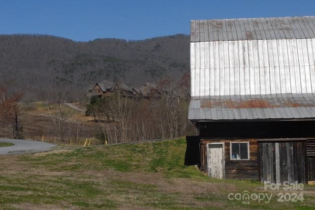 view of home's exterior featuring a mountain view