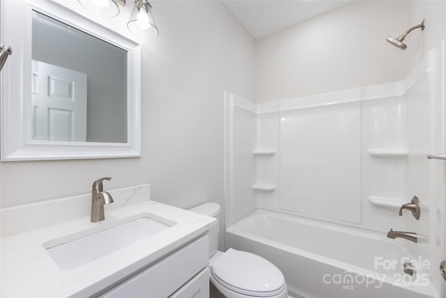 full bathroom featuring vanity, toilet, and tub / shower combination