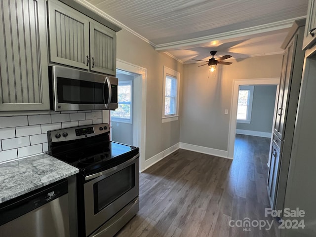 4541 Hall Dairy Rd, Claremont, NC 28610 - kitchen featuring appliances with stainless steel finishes, ornamental molding, backsplash, baseboards, and dark wood finished floors