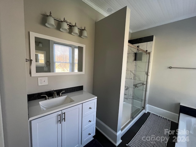 bathroom with vanity, an enclosed shower, and crown molding