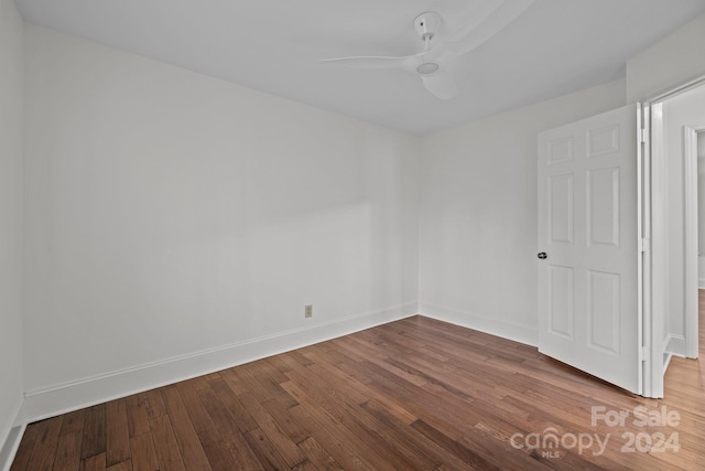 spare room featuring ceiling fan and wood-type flooring