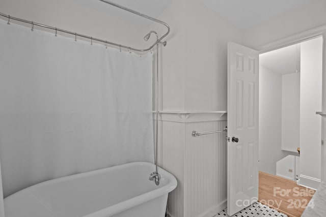 bathroom featuring hardwood / wood-style flooring