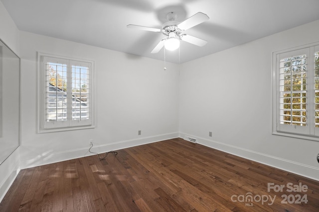 empty room featuring ceiling fan and wood-type flooring