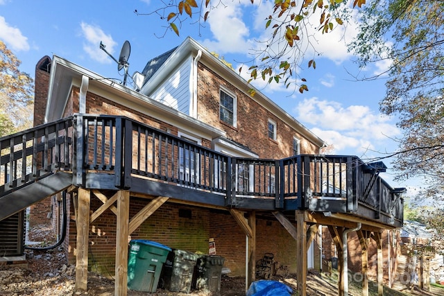 rear view of house with a deck